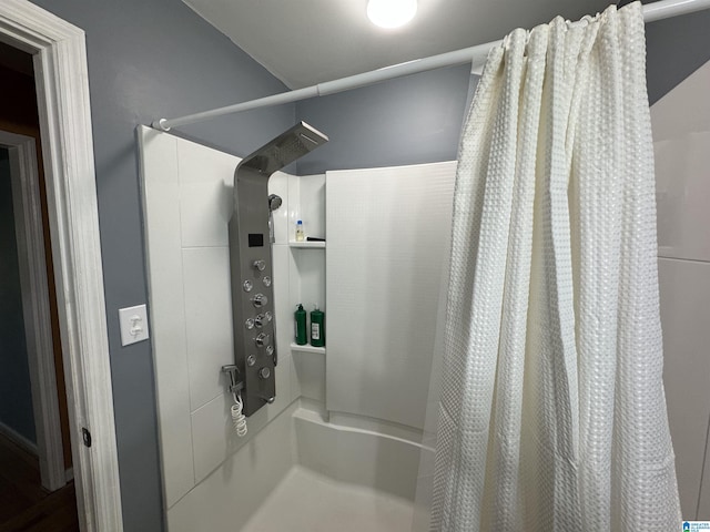 full bathroom featuring curtained shower
