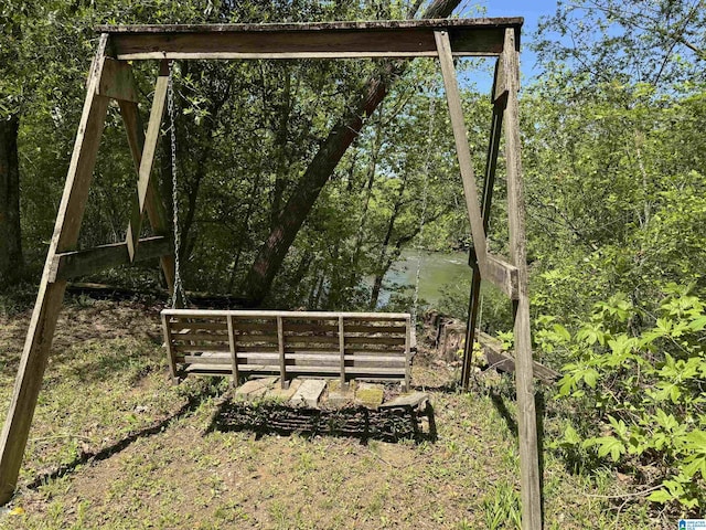 view of community with a water view