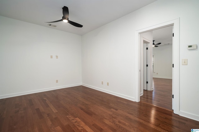 2385 Village Center St, Hoover, AL 35226 - empty room with dark wood finished floors, visible vents, baseboards, and a ceiling fan
