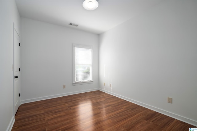 2385 Village Center St, Hoover, AL 35226 - empty room featuring baseboards, visible vents, and dark wood-type flooring