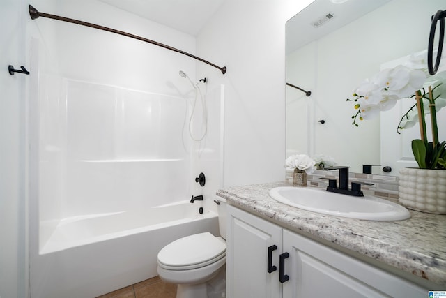 2385 Village Center St, Hoover, AL 35226 - bathroom featuring toilet, visible vents, tile patterned floors, vanity, and shower / washtub combination