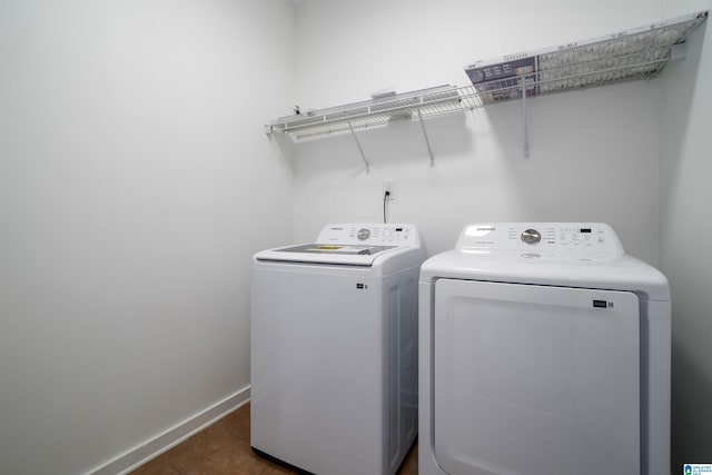 2385 Village Center St, Hoover, AL 35226 - laundry room with separate washer and dryer, laundry area, baseboards, and tile patterned flooring