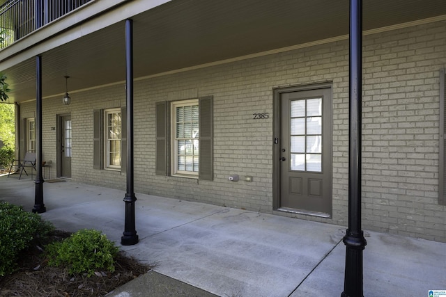 2385 Village Center St, Hoover, AL 35226 - entrance to property with a porch and brick siding