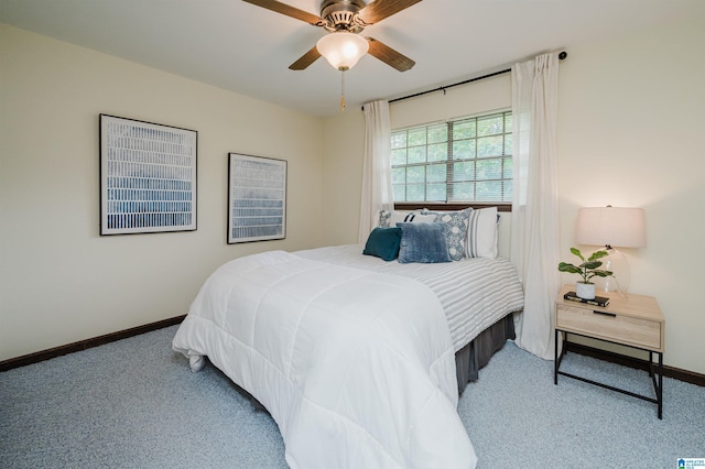 bedroom featuring carpet flooring, baseboards, and ceiling fan