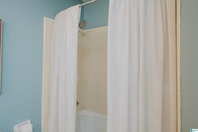 full bathroom featuring shower / bath combination with curtain