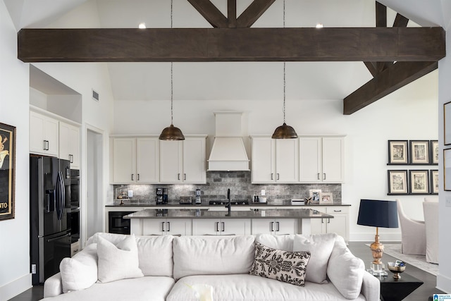 1904 Blackridge Rd, Hoover, AL 35244 - living area featuring baseboards, lofted ceiling with beams, and visible vents