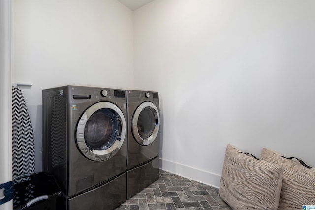 1904 Blackridge Rd, Hoover, AL 35244 - laundry area featuring laundry area, washer and clothes dryer, and baseboards