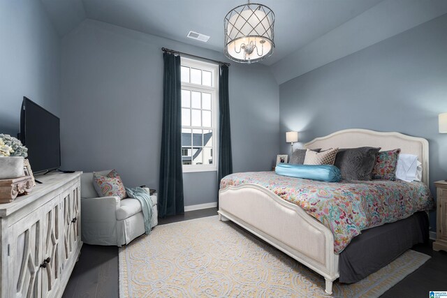 1904 Blackridge Rd, Hoover, AL 35244 - bedroom with visible vents, baseboards, lofted ceiling, and wood finished floors
