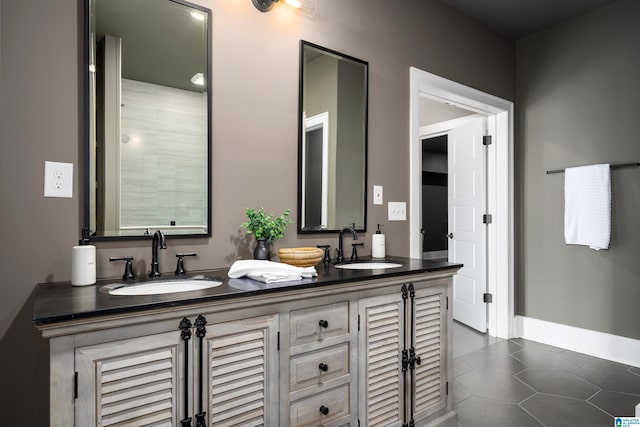 1904 Blackridge Rd, Hoover, AL 35244 - bathroom with a sink, baseboards, and double vanity