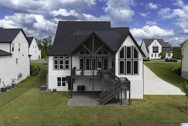 1904 Blackridge Rd, Hoover, AL 35244 - back of house featuring central air condition unit, a patio, a lawn, and a deck