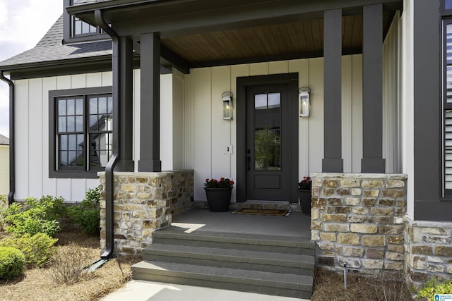 1904 Blackridge Rd, Hoover, AL 35244 - property entrance with a shingled roof, board and batten siding, covered porch, and stone siding