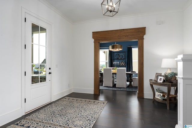 1904 Blackridge Rd, Hoover, AL 35244 - foyer with crown molding, dark wood-style flooring, a chandelier, and a healthy amount of sunlight