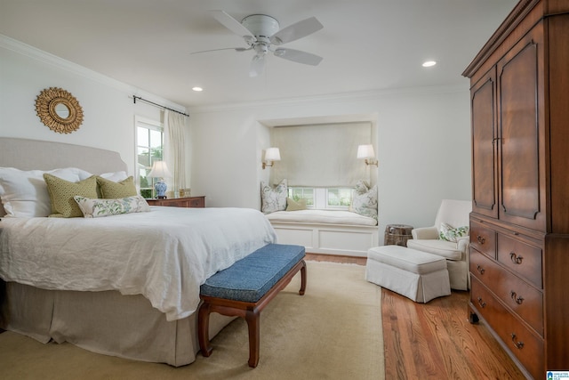 bedroom with recessed lighting, ornamental molding, ceiling fan, and wood finished floors
