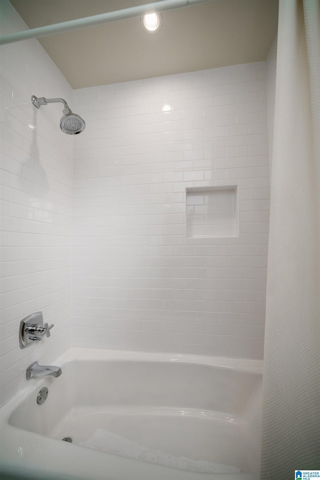 bathroom featuring  shower combination