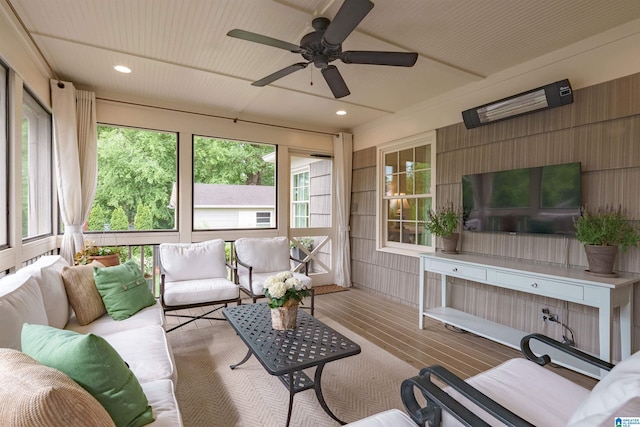 living room featuring ceiling fan, wood finished floors, a healthy amount of sunlight, and recessed lighting