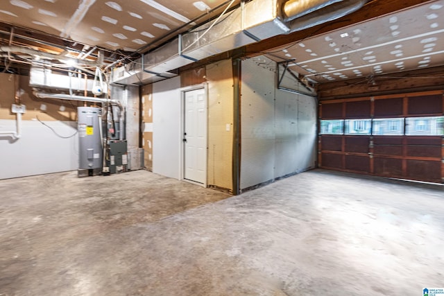 garage with heating unit and water heater