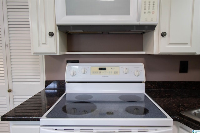 details with white appliances, white cabinets, and open shelves