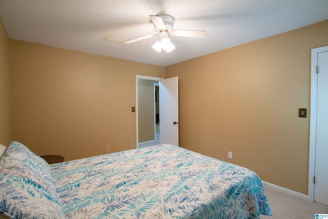 bedroom with baseboards, a ceiling fan, and light carpet