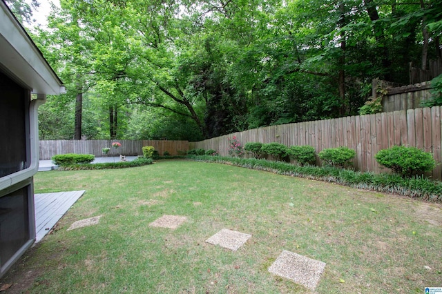 view of yard featuring a fenced backyard