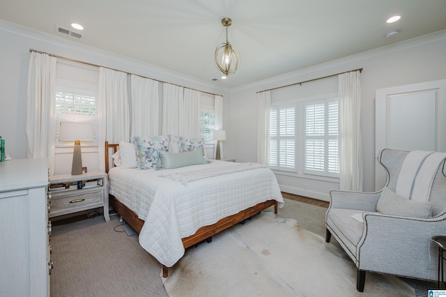 bedroom featuring ornamental molding, recessed lighting, and visible vents
