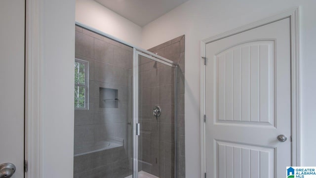 bathroom featuring a stall shower