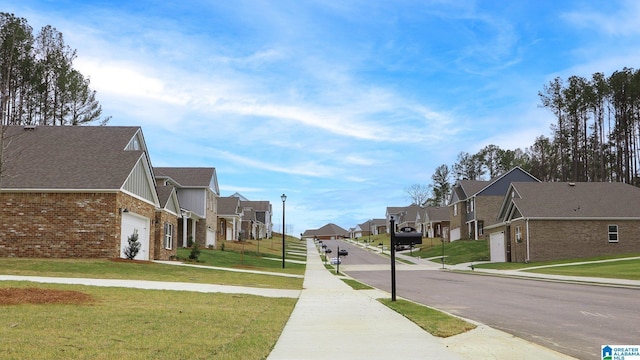 1155 Timberline Rdg, Calera, AL 35040 - view of asphalt street with a residential view, sidewalks, street lighting, and curbs