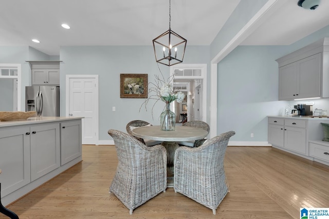 190 Drennen Park Cir, Hayden, AL 35079 - dining room featuring baseboards, light wood-style floors, a chandelier, and recessed lighting