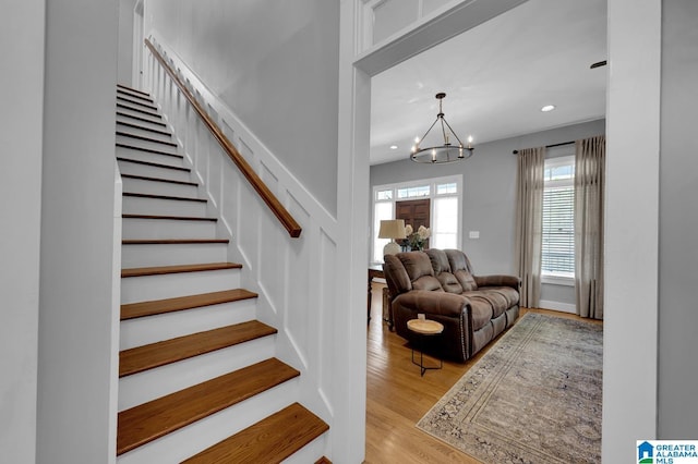 190 Drennen Park Cir, Hayden, AL 35079 - stairs featuring a chandelier, wood finished floors, and recessed lighting