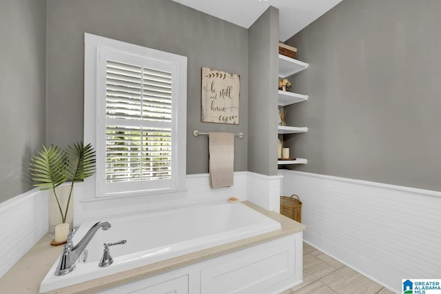 190 Drennen Park Cir, Hayden, AL 35079 - full bathroom with a garden tub and a wainscoted wall