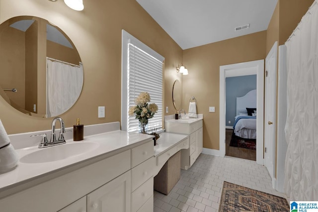 190 Drennen Park Cir, Hayden, AL 35079 - full bathroom with tile patterned floors, vanity, and ensuite bath