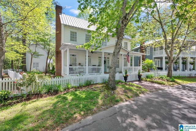 190 Drennen Park Cir, Hayden, AL 35079 - view of front of property featuring covered porch, a chimney, a fenced front yard, metal roof, and ceiling fan