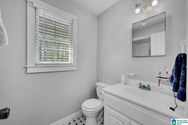 190 Drennen Park Cir, Hayden, AL 35079 - half bath featuring toilet, baseboards, vanity, and tile patterned floors