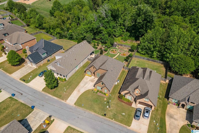 birds eye view of property with a residential view