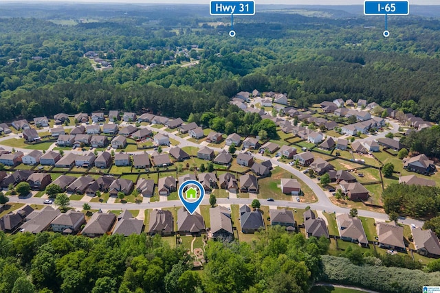 bird's eye view with a residential view and a forest view