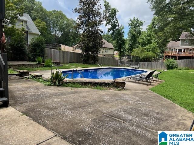 96 Tomahawk Cir, Pelham, AL 35124 - view of pool featuring a fenced backyard and a patio area