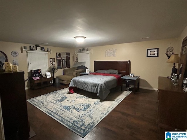 1003 Old Samaria Rd, Clanton, AL 35045 - bedroom featuring baseboards and wood finished floors