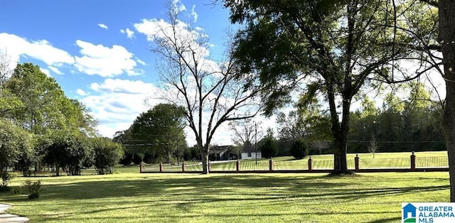 1003 Old Samaria Rd, Clanton, AL 35045 - view of home's community with a yard and fence