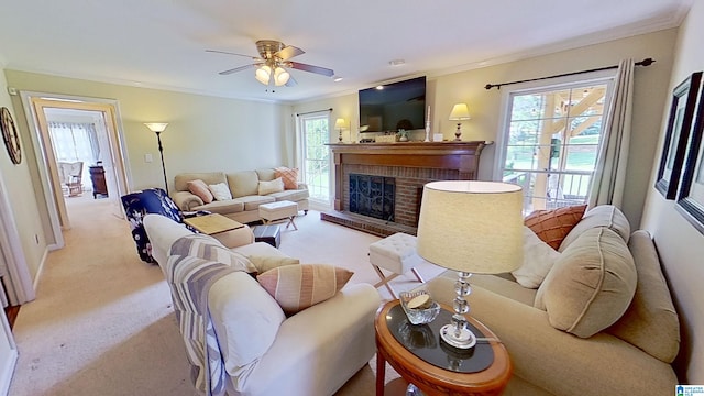 214 Scotts Trce, Helena, AL 35022 - living room featuring ornamental molding, a fireplace, a ceiling fan, and light carpet