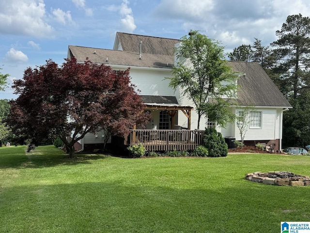 214 Scotts Trce, Helena, AL 35022 - rear view of house with a lawn, a fire pit, covered porch, and central air condition unit