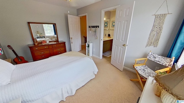 214 Scotts Trce, Helena, AL 35022 - bedroom featuring connected bathroom, baseboards, and light carpet