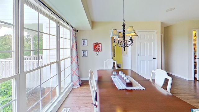 214 Scotts Trce, Helena, AL 35022 - dining space featuring baseboards, a chandelier, and light wood-type flooring
