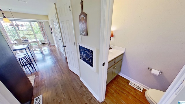 214 Scotts Trce, Helena, AL 35022 - corridor with baseboards, wood finished floors, and visible vents