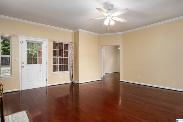unfurnished room featuring wood-type flooring, a ceiling fan, ornamental molding, and baseboards