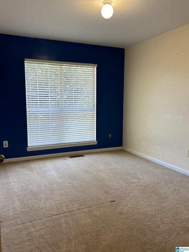 41 Woodland Ridge Rd, Odenville, AL 35120 - spare room featuring visible vents, carpet floors, and baseboards