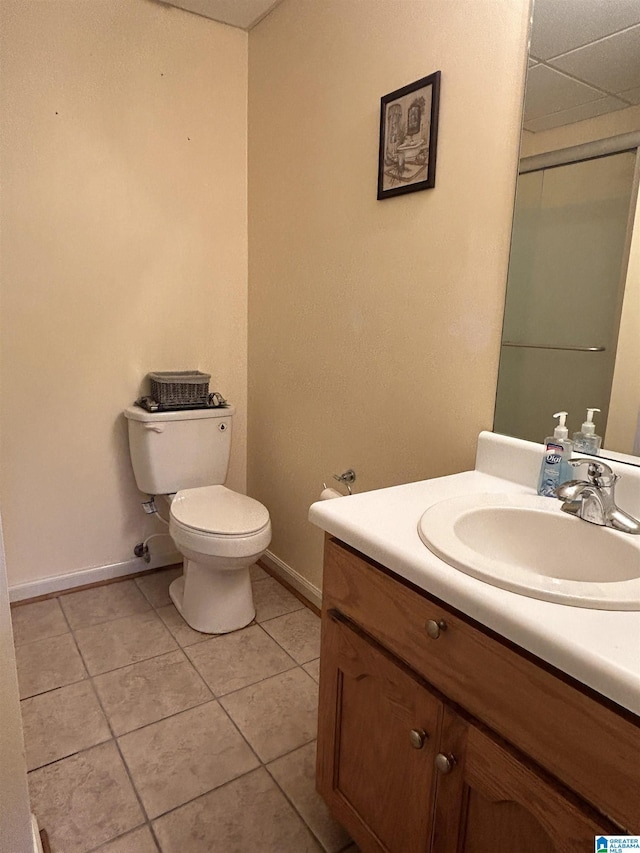 41 Woodland Ridge Rd, Odenville, AL 35120 - bathroom with toilet, tile patterned flooring, vanity, and baseboards