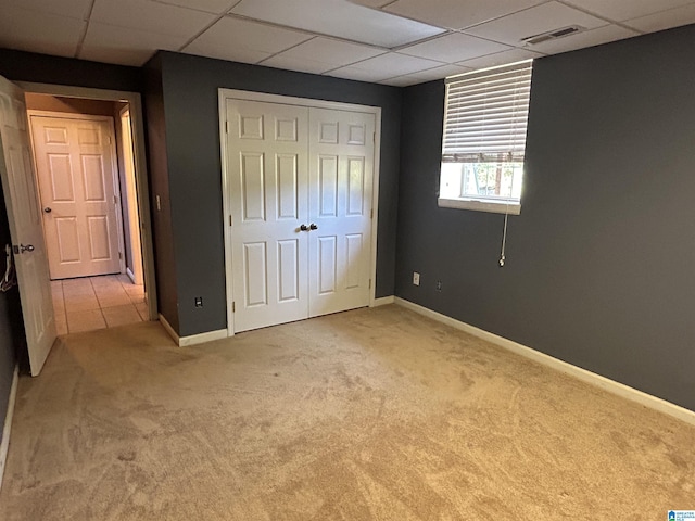 41 Woodland Ridge Rd, Odenville, AL 35120 - unfurnished bedroom with visible vents, a drop ceiling, carpet floors, and baseboards
