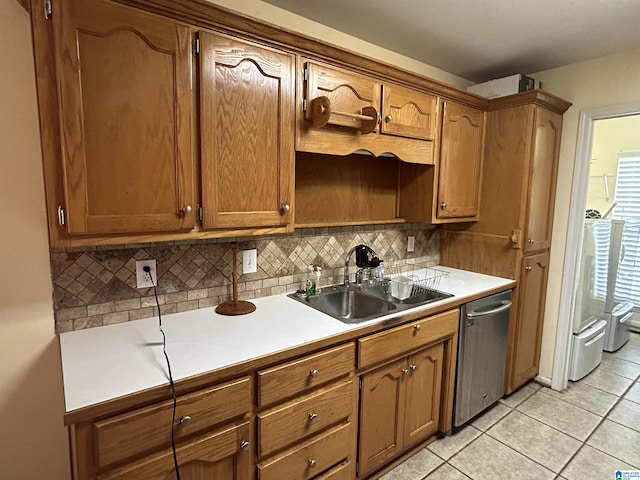 41 Woodland Ridge Rd, Odenville, AL 35120 - kitchen with stainless steel dishwasher, a sink, backsplash, and light countertops