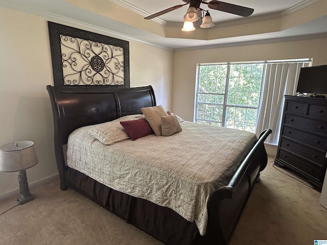 41 Woodland Ridge Rd, Odenville, AL 35120 - carpeted bedroom featuring a raised ceiling, ceiling fan, ornamental molding, and baseboards