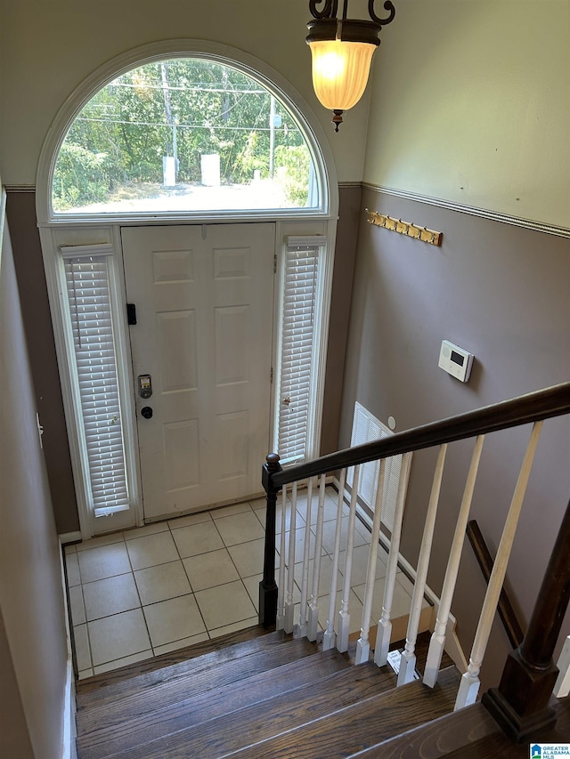 41 Woodland Ridge Rd, Odenville, AL 35120 - entryway featuring light tile patterned flooring, stairs, and plenty of natural light
