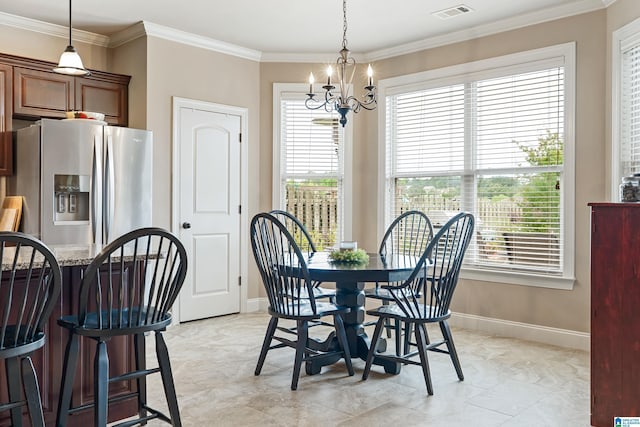dining area with a healthy amount of sunlight, visible vents, ornamental molding, and an inviting chandelier